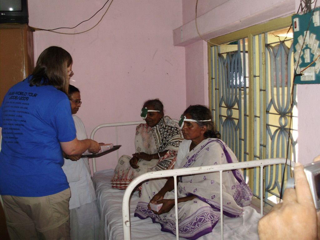 Patients at a Rotary Eye Hospital are dispensed post operative medicines in the recovery room