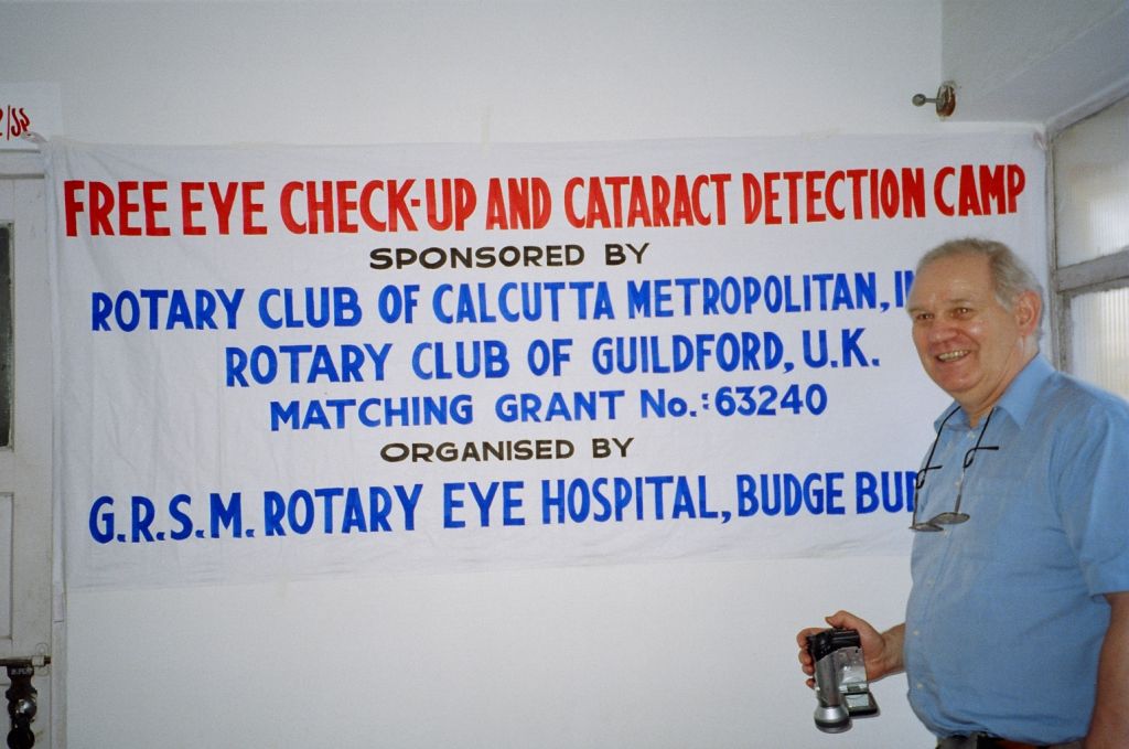 Andrew Jackson, one of the Charities Trustees, inspects the free eye check up facility provided at a Indian Rotary Eye Clinic.